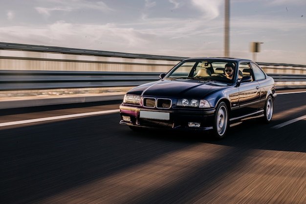 vintage sedan car driving road 114579 5065